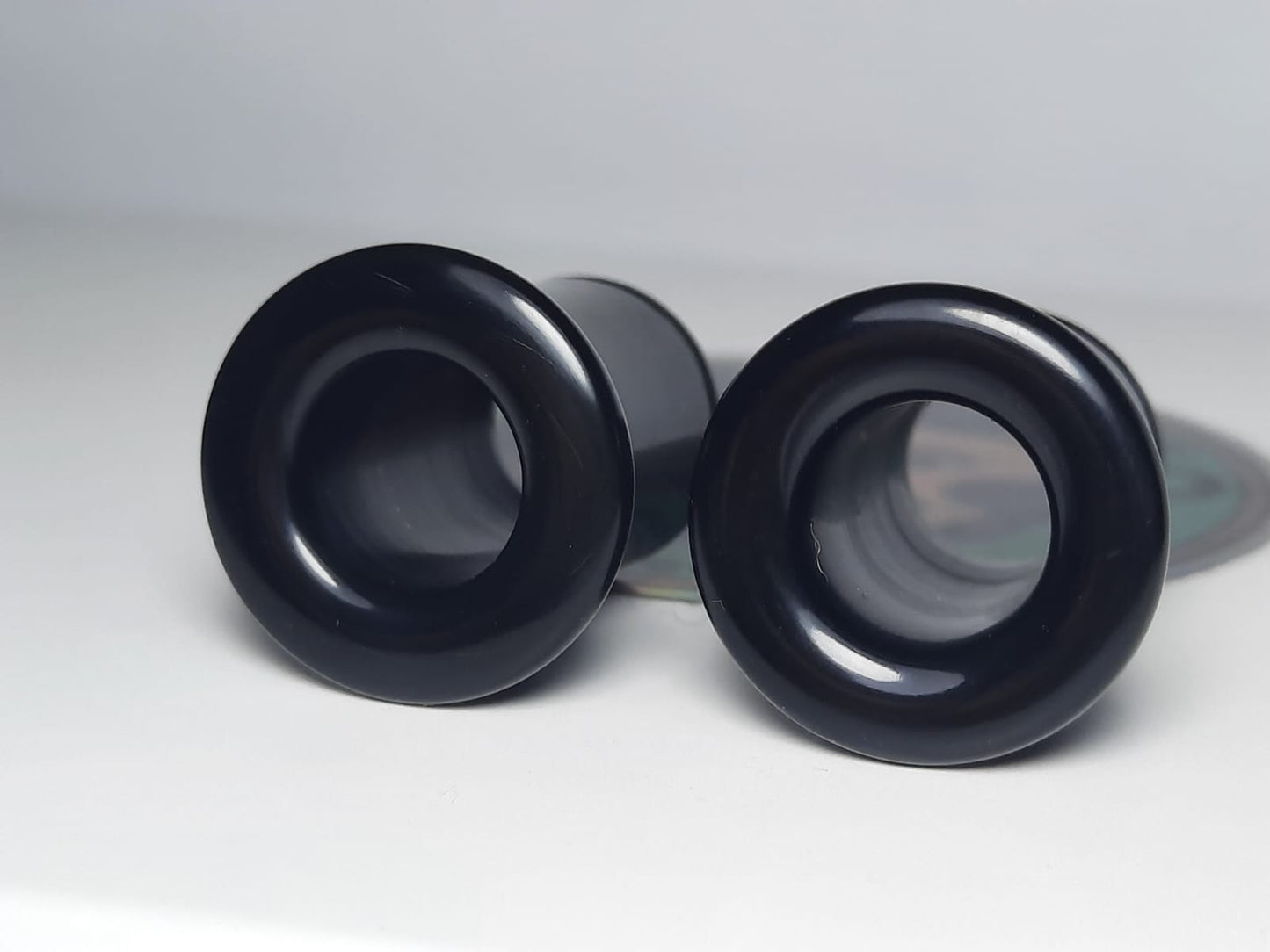 Tuneles de Delrin con flare sencillo - Mandar a fabricar