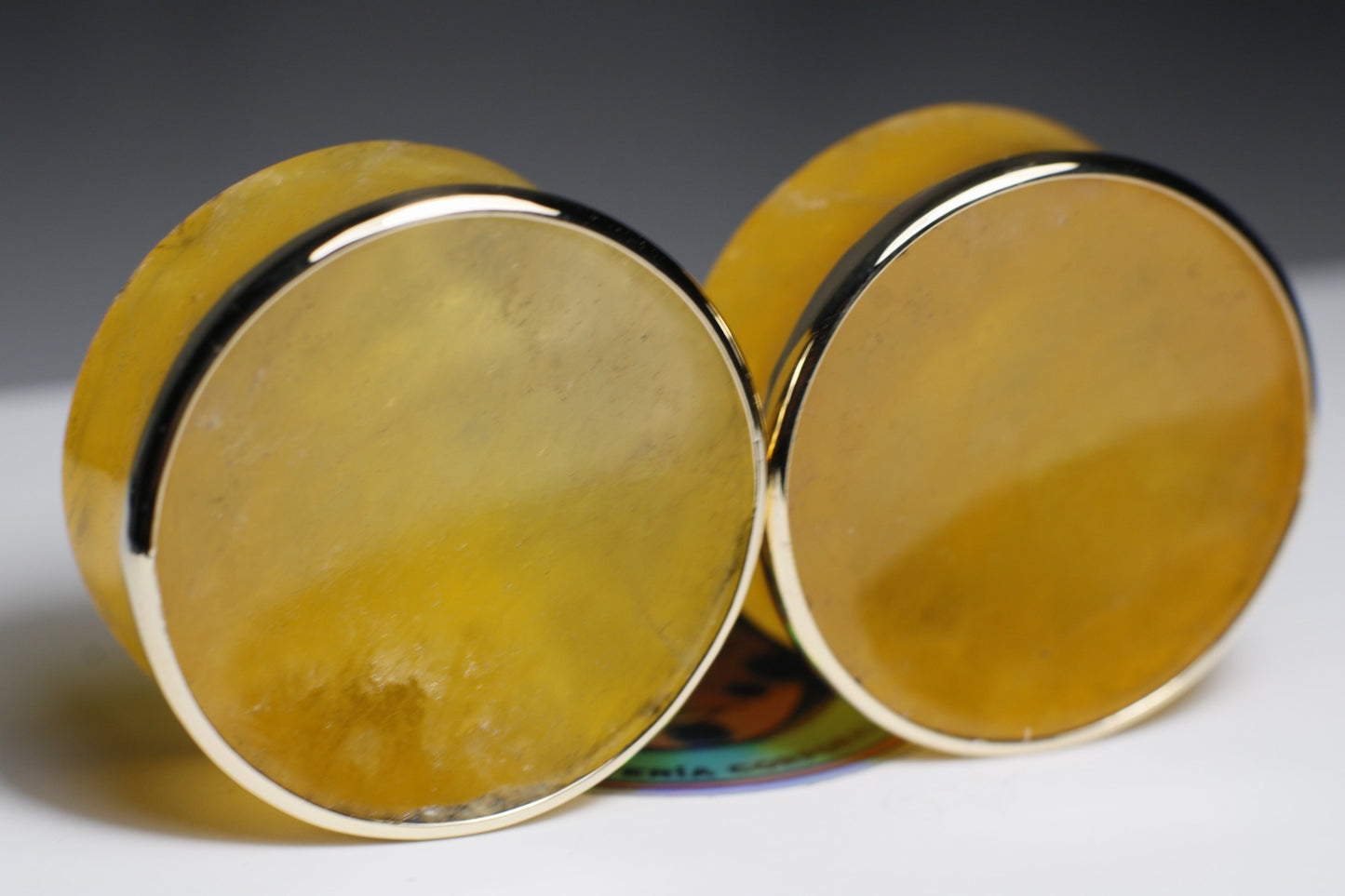 Plugs de calcita naranja con bizel dorado  - Mandar a fabricar