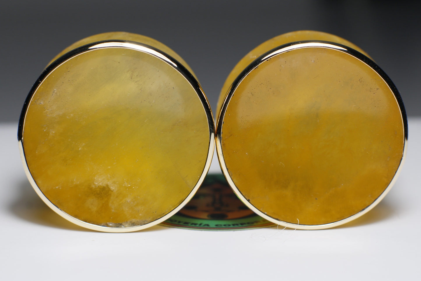 Plugs de calcita naranja con bizel dorado  - Mandar a fabricar
