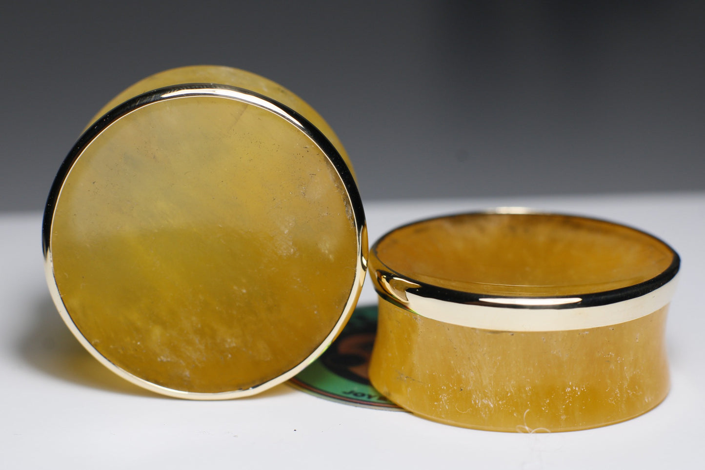 Plugs de calcita naranja con bizel dorado  - Mandar a fabricar